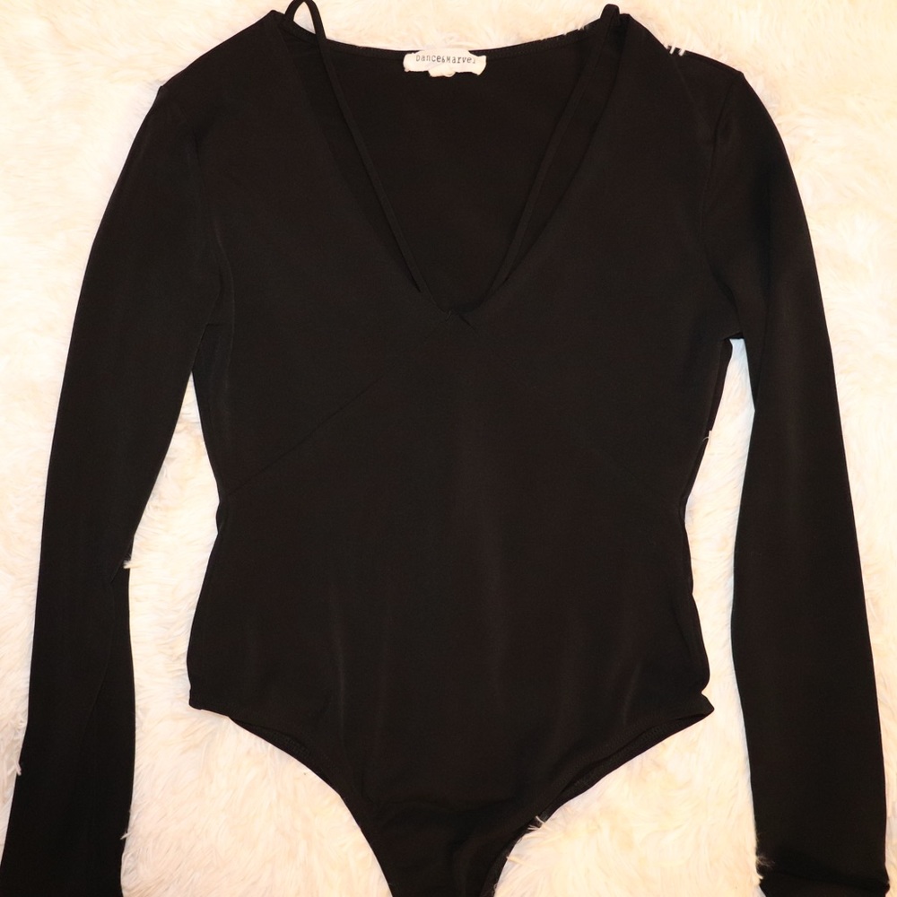 Long sleeved black body suit